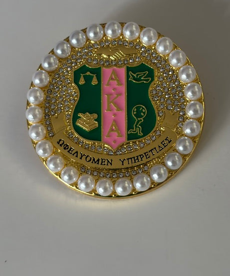 ROUND GOLD BROOCH